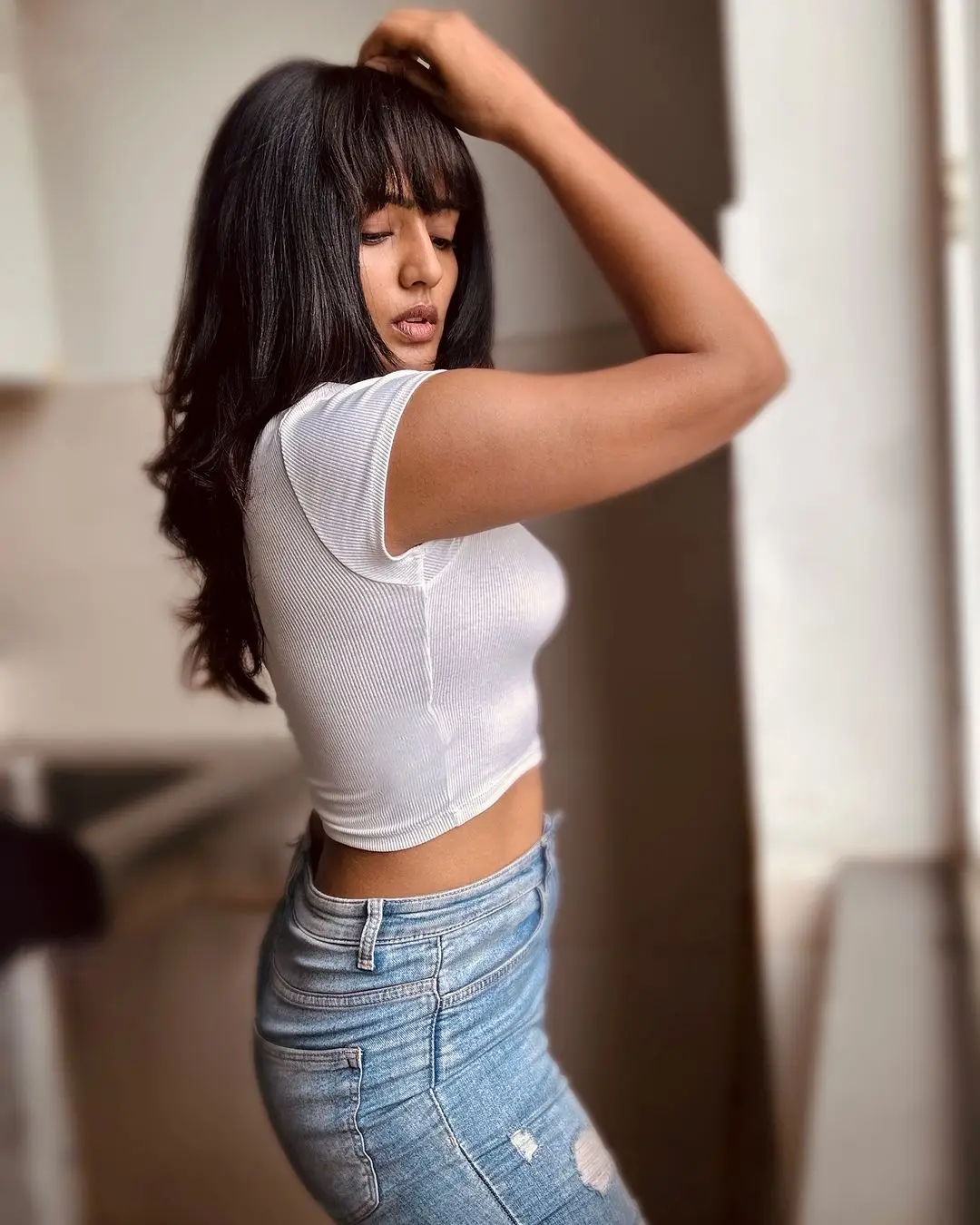 Eesha Rebba Stills in Beautiful White T Shirt Blue Jeans